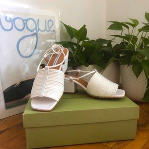 About Arianne Martin Heels in White